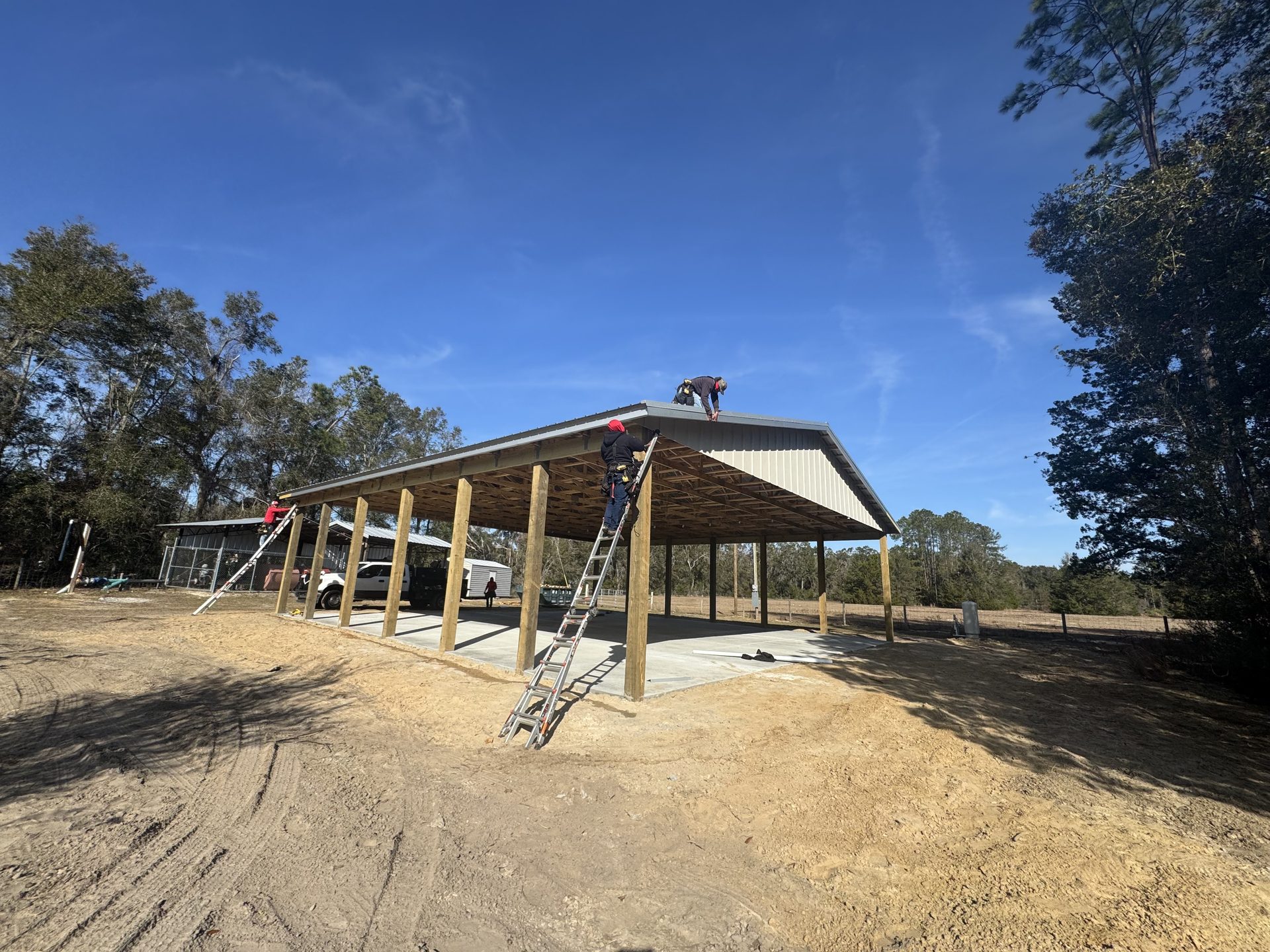 Completed enclosed pole barn structure on a Florida property