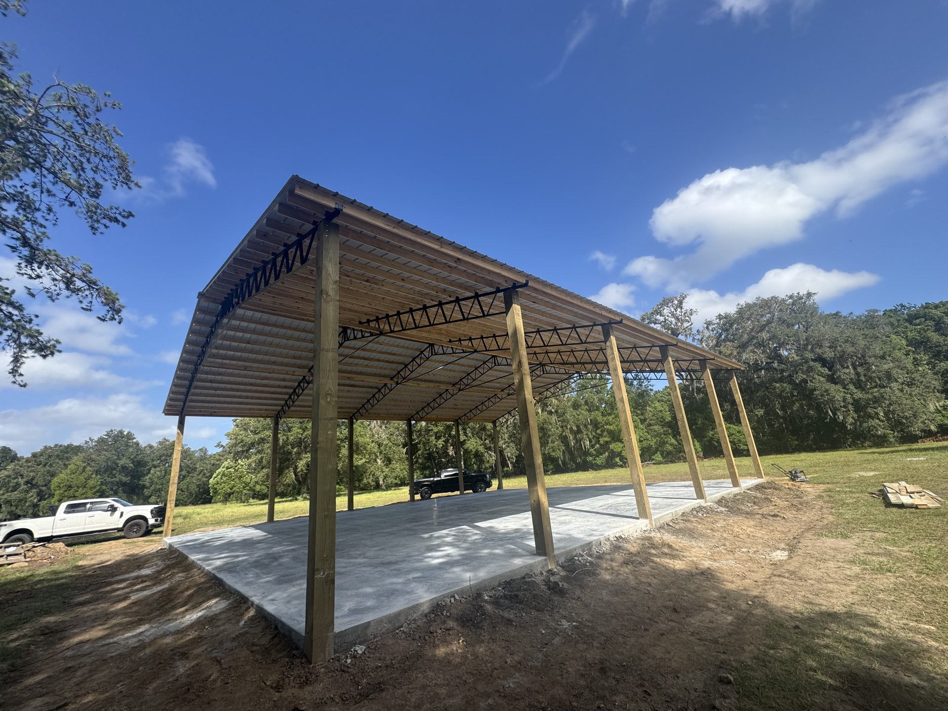 Large commercial-style pole barn on open lot