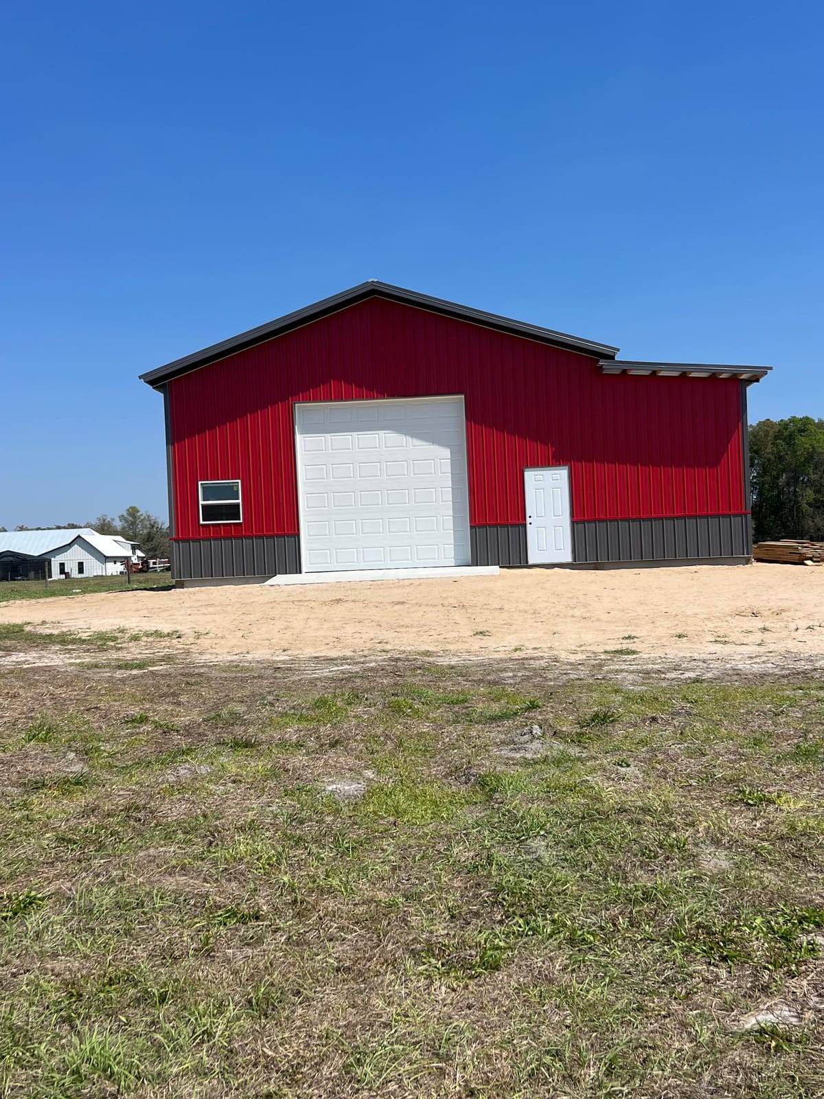 Garages — Red barn with white garage door