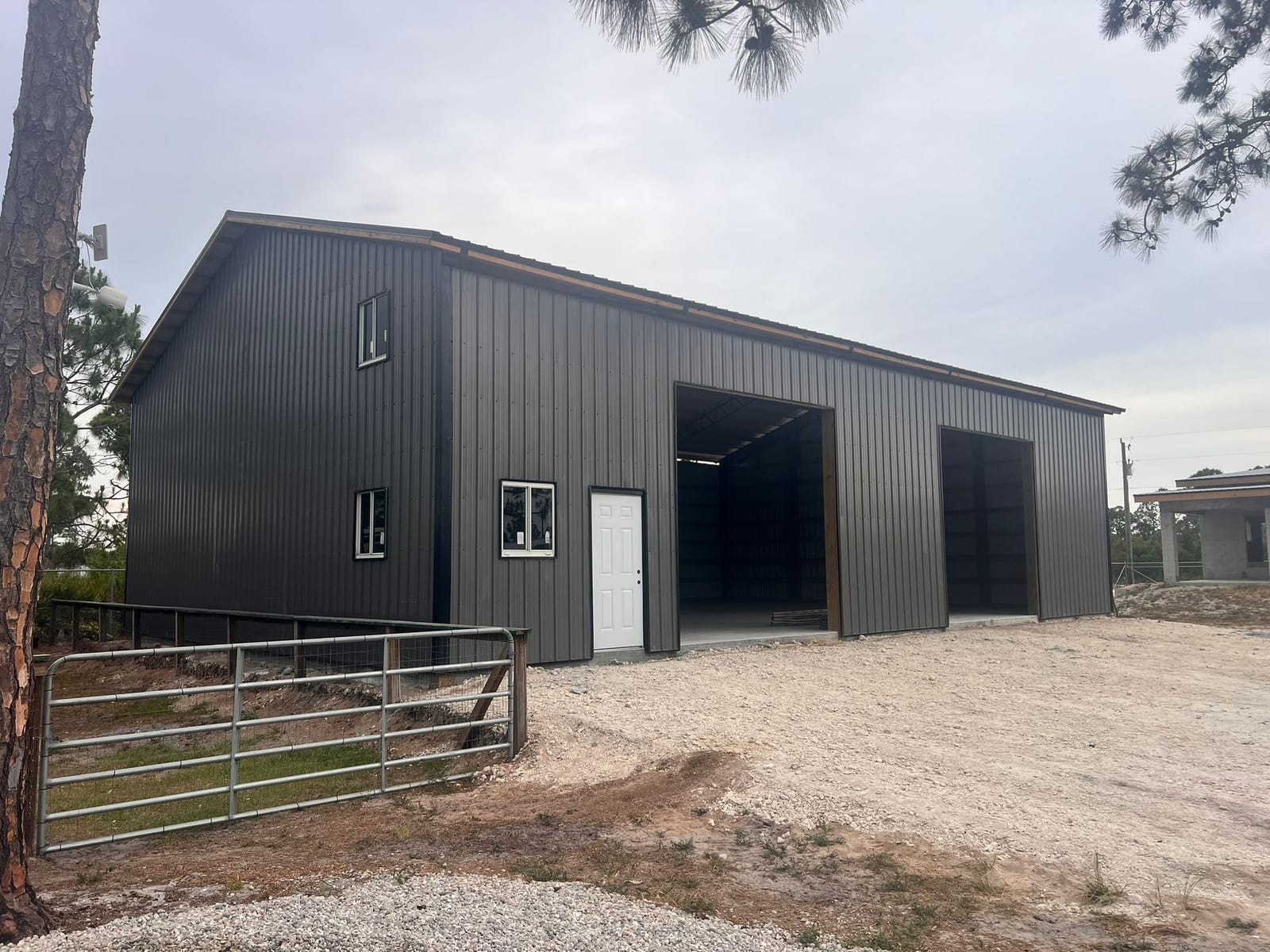 Garages — Gray two-bay barn with loft