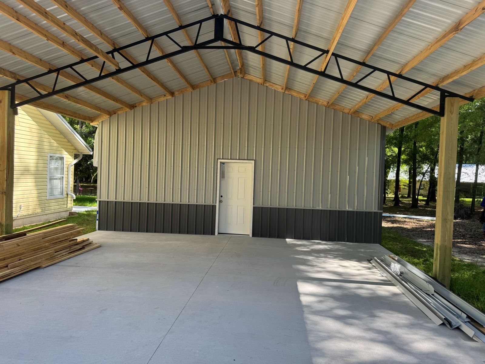 Garages — Enclosed garage with covered carport
